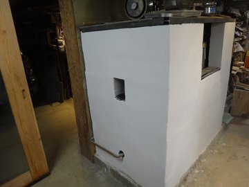 mason stove- access to regulator: forces exhaust air around side pocket